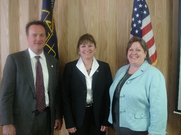 In November, Adrian Felts, chapter president, and Debra Harvey (r), chapter executive vice president, welcome guest speaker the Honorable Terrie Suit, secretary of homeland defense and veterans' affairs, Commonwealth of Virginia.